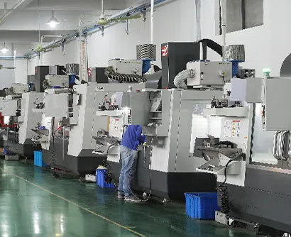 Factory worker inspecting defective paper cups on a conveyor belt – blurred background of slow-moving machinery