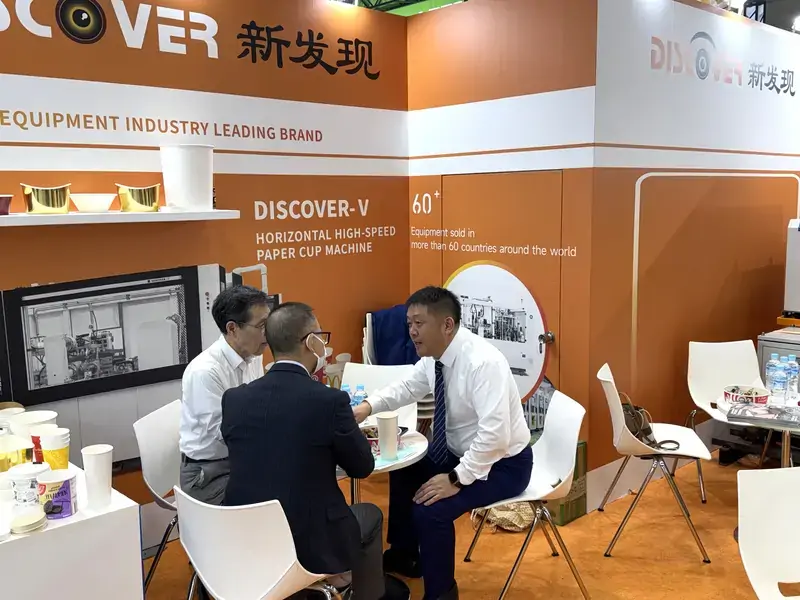Discover Machinery team discussing paper cup machine cooperation with Japanese buyer